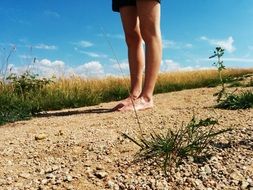 Woman standing on a grass