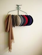 scarf and hats on vintage wall hanger
