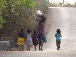 parents and children together go on road