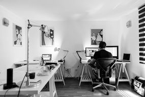 Black and white photo of the office workplace