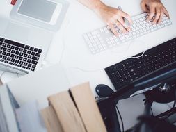 keyboards and laptop on the office table