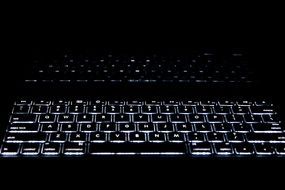 keys with letters on the keyboard and their reflection