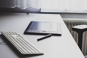 black keyboard and graphic tablet