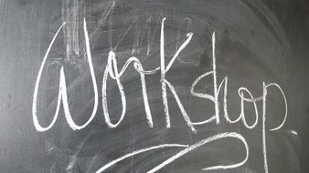 chalk inscription on black chalkboard