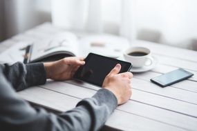 digital tablet in male hands