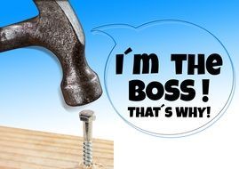 a hammer, a nail and the inscription