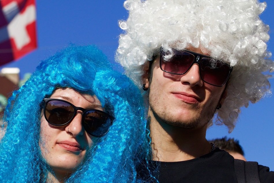 the men in the funny colored wigs