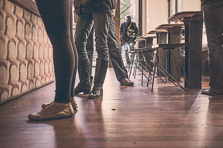 Legs in boots bar restaurant interior
