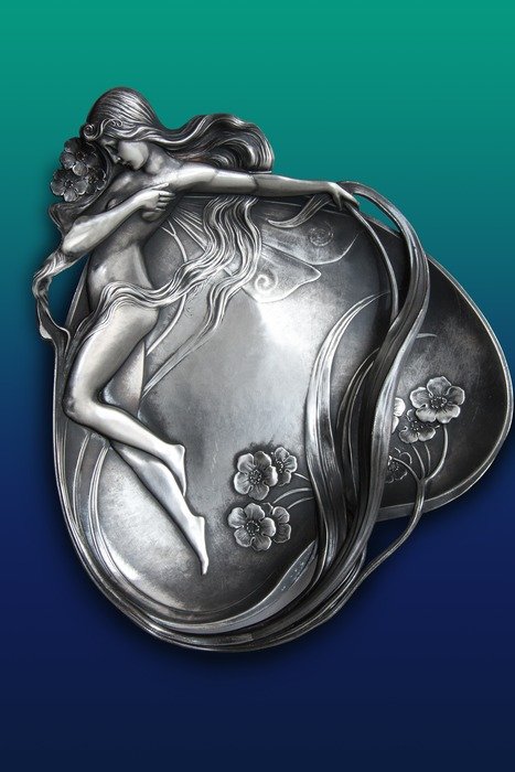 silver bowl with a picture of a girl