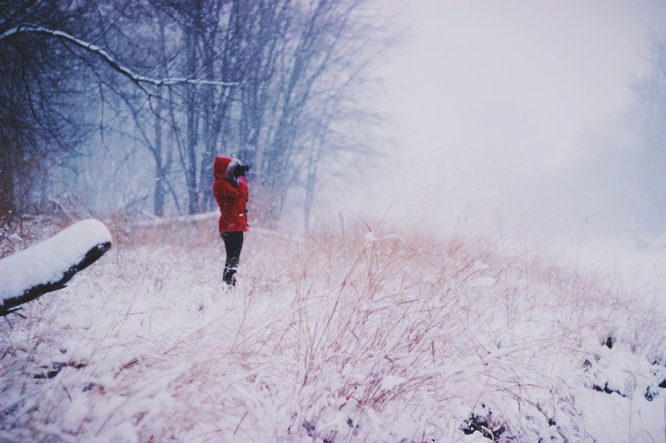 Woman in the snowy forest