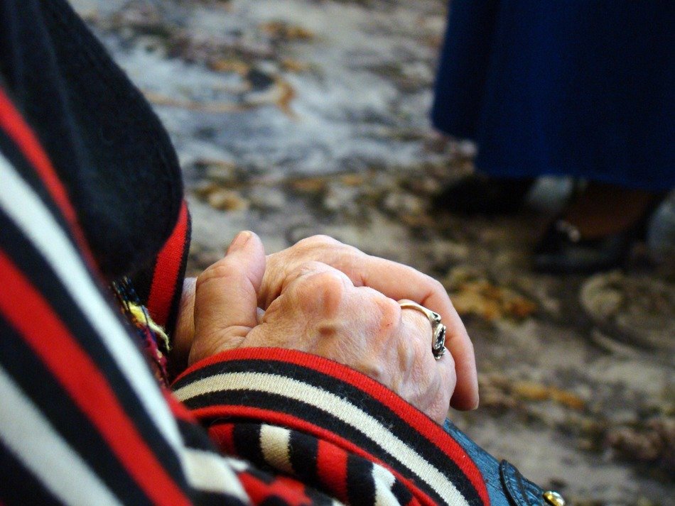 hand of an old woman with a ring