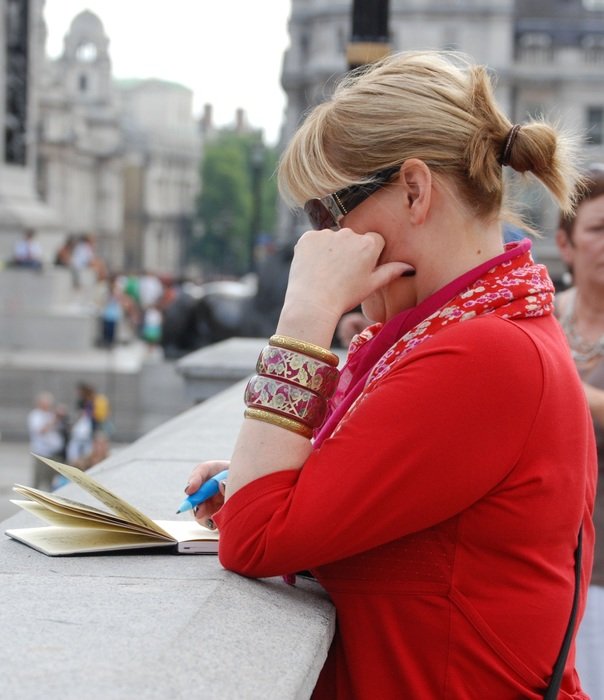 woman making notes in the diary