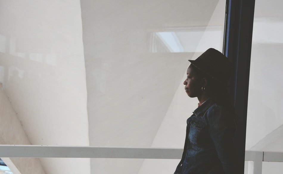 African woman near the window
