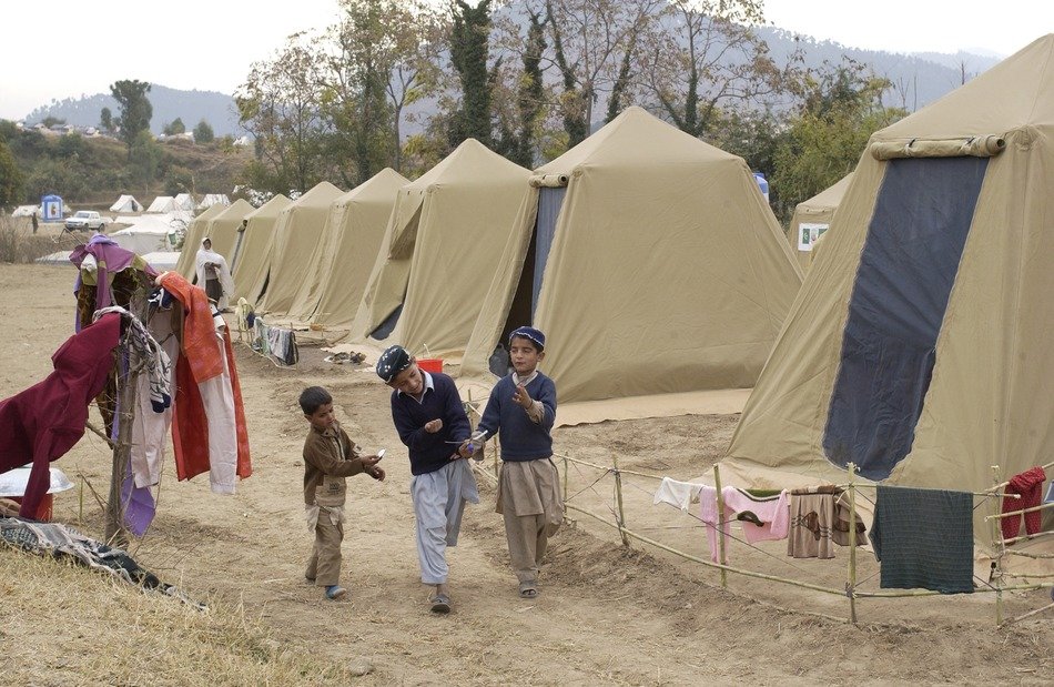 children near tents in pakistana