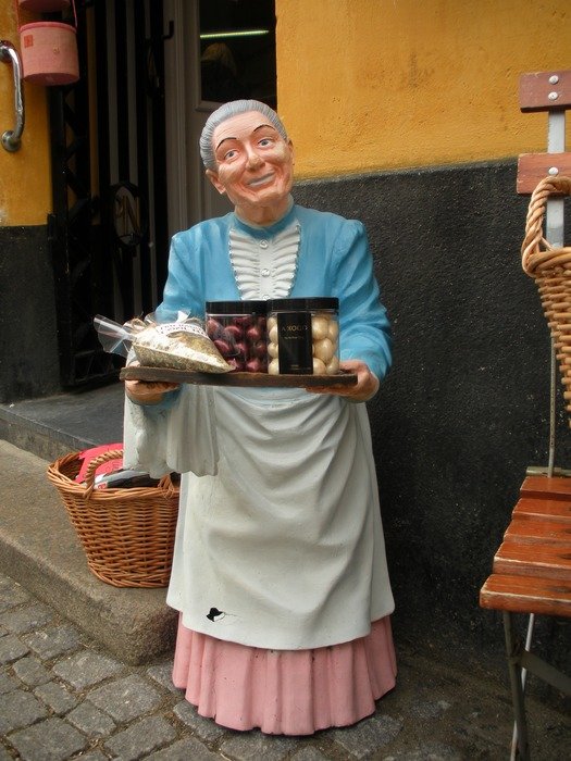 statue of an old woman as a decoration of the store