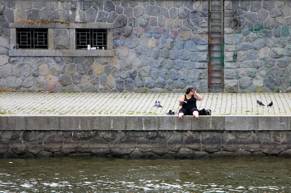 woman on the riverside Vltava