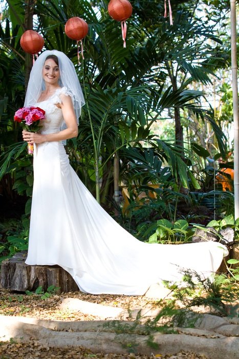 bride in a beautiful dress under the lanterns