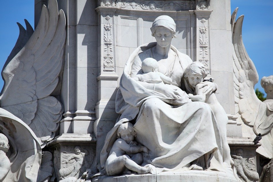 statue of woman with children