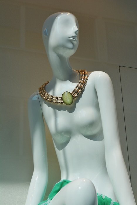 stylish necklace on display dummy