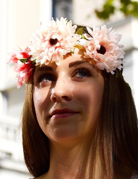 Portrait of the beautiful woman with the wreath