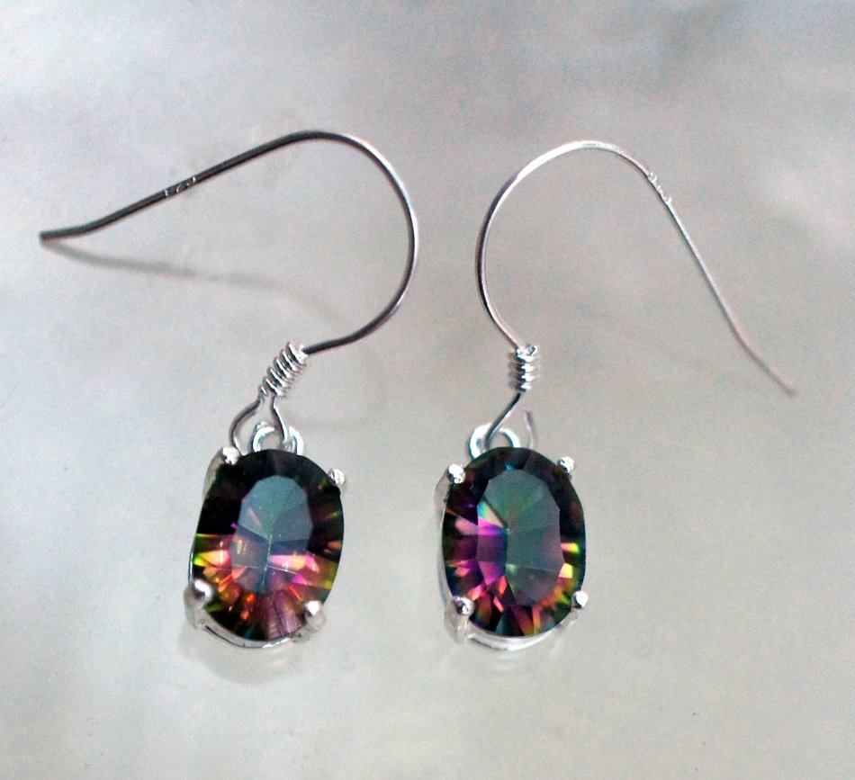 Earrings with topazes in it