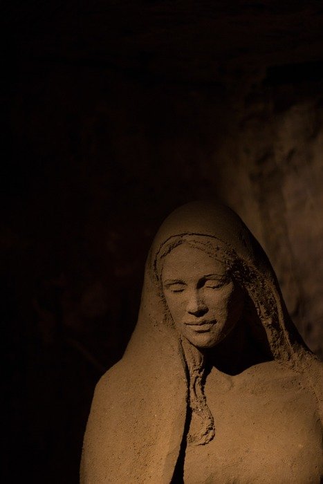sand sculpture maria dark background