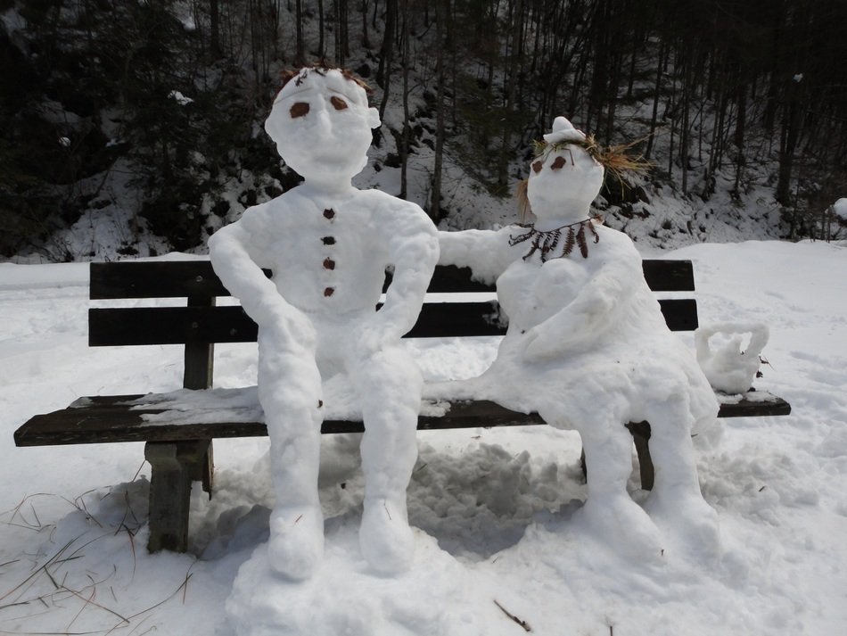 snow figures on the bench