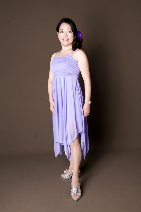 brunette in the purple dress
