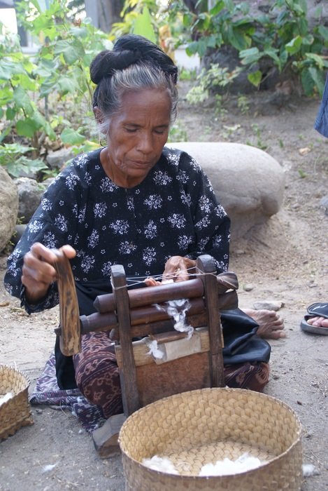 woman near the machine in indonesia