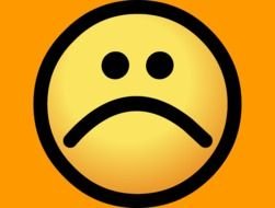 sad smiley on an orange background