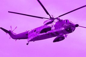 black and white military helicopter in the sky
