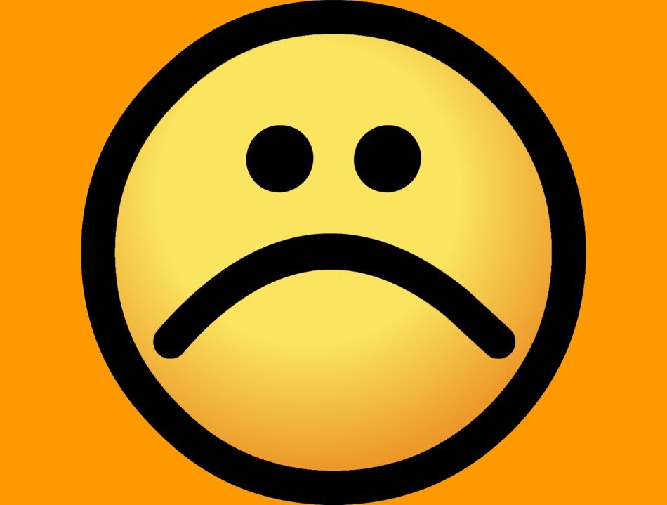 sad smiley on an orange background