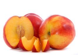 ripe peaches on a white background