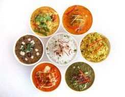 variety of indian food on plates