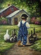 painted baby in denim overalls on a farm
