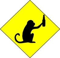 monkey with a bottle on a yellow sign