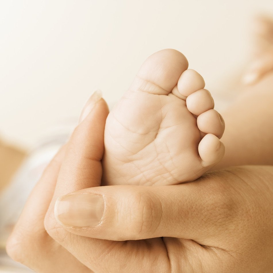 feet of a newborn as a picture for clipart