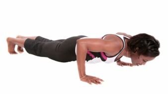 girl doing sports exercise on the floor
