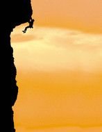 silhouette of a mountaineering man