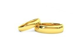 Cross And two golden Wedding Rings