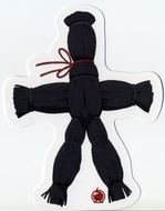 doll made of straw on a white background