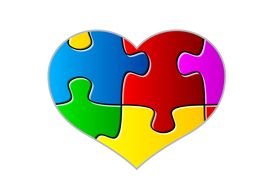 colorful puzzles on the heart as a picture for clipart