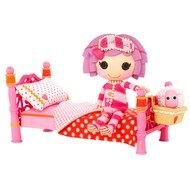 Lalaloopsy sits on bed, plastic rag dolls