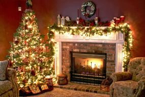 Christmas tree near the fireplace as a picture for clipart