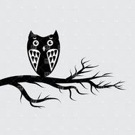 painted black owl on a branch