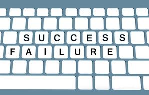 success and failure words on keyboard, challenge concept