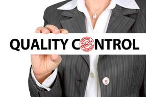 Business woman in hands holds quality control