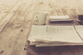 newspaper coffe on desk vintage photo