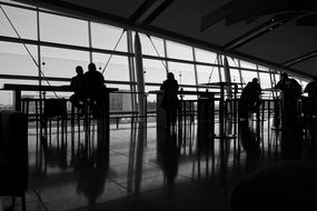 Black and white photo of the cafe in the airport