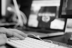 black and white photo of a computer keyboard